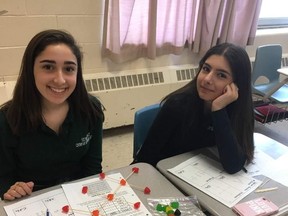 St. Benedict students Sydney Grenier, left, and Brianna Deline built a propane molecule using jujubes. Supplied photo