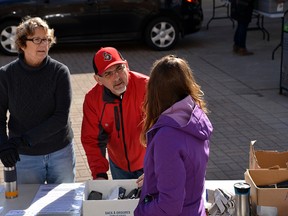 Submitted photo
Belleville mayor Taso Christopher speaks to a volunteer during the 2017 staging of Quinte Trash Bash. The annual event, which returns to the region April 21, encourages residents to do their part in cleaning their city or town.