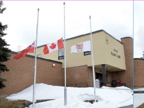 Photo by KEVIN McSHEFFREY/THE STANDARD
The flags in front of Elliot Lake city hall and the Elliot Lake Fire Service are flying at half mast. The gesture is to show respect and solidarity with the community of Humboldt, Saskatchewan following the tragedy last Friday when 15 members of the Humboldt Broncos junior hockey family were killed, and the rest of the team players were injured after a collision with a tractor-trailer. The city wants to keep the flags to remain at half mast for 15 days, one day for each of those killed, or until such time as deemed appropriate, stated CAO Dan Gagnon in an email. The East Algoma OPP in Elliot Lake have also lowered the flags in front of the detachment out of respect for the Humboldt Broncos tragedy.