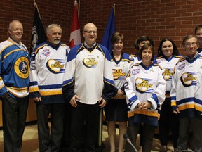 (Left to Right) Councillor Bruce Inglis, councillor Keith McGrath, councillor Phil Meagher, Mayor Don Scott, councillor Verna Murphy, councillor Jane Stroud, councillor Claris Voyageur, councillor Krista Balsom, councillor Mike Allen and councillor Sheila Lalonde wear Oil Barons hockey jerseys in support of the Humboldt Broncos team and community. Laura Beamish/Fort McMurray Today/Postmedia Network