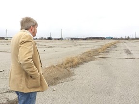 Pete Sheridan, president of the Elgin Historical Society, stands in the now-vacant lots of the Ford Plant on Sunset Drive which closed its doors for good in September 2011. The upcoming meeting of the Historical Society will reflect on the history of the plant in St. Thomas and Elgin County. (LOUIS PIN, Times-Journal)