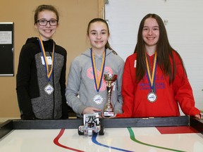 From left, Julia Dowson, Sydney Ryan and Emily Dearing finished first at a robotics competition for Grades 7 and 8 students at D&D Automation on Wednesday, April 11, 2018 in Stratford, Ont. (Terry Bridge/Stratford Beacon Herald)