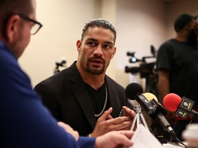 Roman Reigns answers a question at Friday's international media day as part of WrestleMania 34 weekend in New Orleans. (Photo by Ricky Havlik/SLAM! Wrestling)