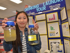 Hepworth Central Public School Grade 6 student Islay Graham with her science fair project about how laundering polyester clothes washes microfibres into the environment. She was one of nearly 200 students who competed at the 2018 Junior Bluewater Regional Science & Technology Fair on Wednesday in Owen Sound. (Scott Dunn/The Sun Times)