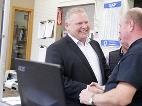 Ontario PC leader Doug Ford tours Maslack Automotive and Industrial Supply in Sudbury on Wednesday.
(Gino Donato/Sudbury Star)