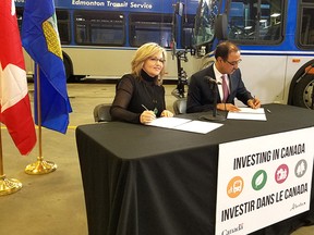 Alberta Infrastructure Minister Sandra Jansen (left) and federal Minister of Infrastructure and Communities Amarjeet Sohi sign the Investing in Canada Infrastructure Plan as a bilateral agreement between the two levels of government, resulting in a $15-million funding announcement for Strathcona County.

Photo Supplied