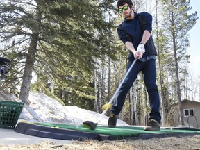 File photo
Aiden McRae is pictured here hitting a golf ball with his new Nike Vapor driver at the Dunes last year. McRae has been playing for eight years but his ninth season will be delayed as low daytime temperatures, combined with sub-zero night readings, means the golf season is weeks from getting into full swing.