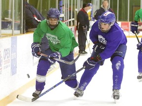 Members of the Rayside-Balfour Canadians run through drills during team practice in Sudbury, Ont. on Thursday April 12, 2018. The Canadians begin the first game of the NOJHL championship final against the Cochrane Crunch on Friday.The best-of-seven final begins Friday and Saturday with Games 1 & 2 at 7 p.m. at Chelmsford Arena.Gino Donato/Sudbury Star/Postmedia Network