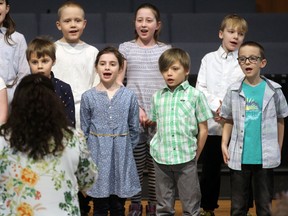 Aimee Aitken, middle, sings along with her classmates during their Kiwanis Festival of the Performing Arts performance at Avondale United Church on Friday, April 13, 2018 in Stratford, Ont. Terry Bridge/Stratford Beacon Herald/Postmedia Network
