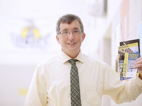 Jacques Mantha, principal at Cyril Varney Public School, with his documentation for the Boston Marathon in Sudbury, Ont. on Thursday April 12, 2018. Mantha has qualified for the marathon and is heading to Boston this weekend for the April 16 event.Gino Donato/Sudbury Star/Postmedia Network