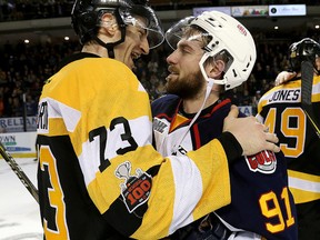 Kingston Frontenacs' Gabe Vilardi, left, and Barrie Colts' Aaron Luchuk, embrace after the Frontenacs defeated the Colts 2-1 to win the Eastern Conference semifinal series 4-2 at the Rogers K-Rock Centre in Kingston on Friday. Both players are from Kingston and it was Luchuk's last junior game. (Ian MacAlpine/The Whig-Standard)
