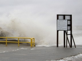 Waves on Lake Erie crash over the pier in Erieau, Ont. on Sunday April 15, 2018. (Ellwood Shreve/Chatham Daily News)