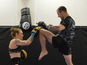 Maggie Poulin and Terry Lemaire train at Total Martial Arts Centre in early April. Both athletes have signed three-fight MMA contracts with TKO, a feeder league for the UFC.