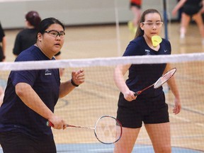 Angelina Lam, left, and Mackenzie Watkins, of Marymount Academy, compete in a senior girls doubles match at the high school badminton championship in Sudbury, Ont. on Saturday April 14, 2018. John Lappa/Sudbury Star/Postmedia Network