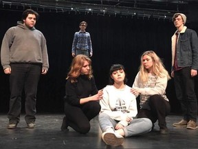 Robert Leitner, left, Hunter Connor, Carter Olsen. Front- Emily Tilander, Emily Sanders and Emily Blumsom are shown in a scene from the Widdifield Secondary School production of Exorcising Restraint.