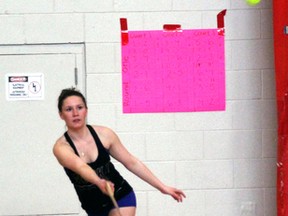 Brittany Lee tries pickleball for the first time Sunday during the YMCA's Pickleball tournament. The sport is gaining popularity and encompasses tennis, badminton and table tennis. The city will host a Pickleball sanctioned event in May and the provincial championships next year.