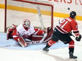 Owen Sound Attack winger Jonah Gadjovich misses a chance on Soo Greyhounds goaltender Matthew Villalta during first-period OHL playoff action Sunday evening in Owen Sound, Ont. Greg Cowan/Postmedia Network