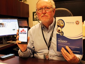 Dave Colvin, Perth County’s emergency management co-ordinator, shows the new Alert Ready logo on his phone. TERRY BRIDGE/POSTMEDIA NETWORK
