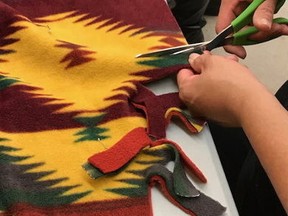 Submitted photo
A member of the Tyendinaga Mohawk Territory cancer talking circle works on a healing blanket.