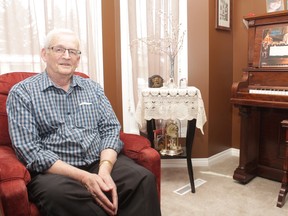 KEVIN RUSHWORTH HIGH RIVER TIMES/POSTMEDIA NETWORK. Bill Holmes received the Sovereigns Medal for Volunteers from the Governor General of Canada's office. He has been the volunteer photo archivist at the Museum of the Highwood since 1997.