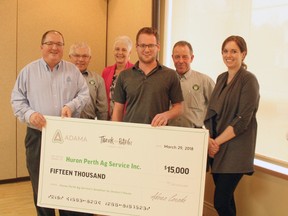 ADAMA area business manager Stuart Cullen presents Huron Perth Ag Service Inc. with the Thank a Retailer cheque for $15,000. Huron Perth Ag Service Inc. donated the cheque to Jessica’s House as the foundation was their charity of choice. Above, ADAMA area business manager Stuart Cullen, Vern Thompson, office administrator Deb Thompson, Sales Representative Drew Kerslake, Sales Representative  Jeff Borland and office administrator Lindsay Govers.(William Proulx/Exeter Lakeshore Times-Advance)