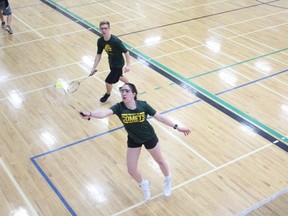 Avery South (foreground) and her partner Zach Degerness competed in mixed doubles at badminton league play at MUCC on Wednesday, April 11.