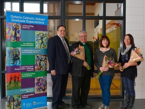 Michael Bellmore, left, board chair of the Sudbury Catholic District School Board, congratulates Chairperson's Award recipients Steve Callaghan, Paola Stefanuto and Julie Hammond. Supplied photo