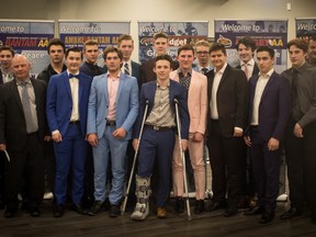 PHOTO SUPPLIED
Wade Wallan (far left, front row) with his Minor Midget Storm hockey club at the recent Grande Peace Athletic Club hockey banquet. Wallan has decided to hang up the clipboard, wanting to spend more time with his family.