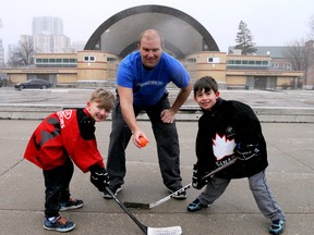 Greg Matthison, overseeing a faceoff here between Keaton Flick and Ashton Malacaria, is helping bring ball hockey back to Victoria Park this spring. (CHRIS MONTANINI\LONDONER)