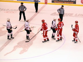 Owen Sound Attack captain Jacob Friend leads his team through the handshake line after the Sault Ste. Marie Greyhounds' 9-7 victory in Game 7 of the Western Conference semifinal. Greg Cowan/The Sun Times.