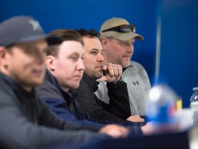 Canmore Eagles AJHL team staff watching players try out at spring camp are from left, goaltending coach Justin Cardinal, assistant coach Evan McFeeters, head coach and GM Andrew Milne and trainer Dino Senn, on Saturday, April 14, 2018. photo by Pam Doyle/www.pamdoylephoto.com