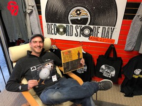 Mark Alles, the manager of The Record Works, shows off a couple of the limited-edition records that will be available Saturday during Record Store Day (BRUCE URQUHART/SENTINEL-REVIEW)