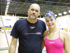 Coach Dean Henze with swimmer Nina Kucheran at Sudbury Laurentian Swim Club practice on Tuesday. Gino Donato/Sudbury Star