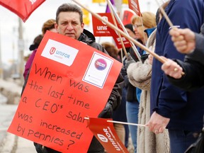 Luke Hendry/The Intelligencer
Hospital supply worker Jake Gibson pickets Wednesday outside Belleville General Hospital. Gibson is a past president of Unifor Local 8300 and said the arbitration process is flawed.