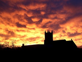 The setting sun and clouds form an unusual pattern over St. Mark's Church in Barriefield on Monday evening May 1 2017 after a heavy rain storm over Kingston. Ian MacAlpine /The Whig-Standard/Postmedia Network