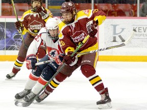 Timmins Majors forward Gabienen “Gabby” Kioki — shown here battling for a loose puck with North Bay Trappers forward Bailey Chenier during Game 3 of the GNML semifinals at the McIntyre Arena on Feb. 24 — was selected by the North Bay Battalion in the third round of the 2018 Under-18 OHL Priority Selection, 46th overall. Kioki will be attending the Battalion’s 2018 orientation camp on May 28 at Memorial Gardens. He will also be on the ice for this weekend’s Majors tryouts at the Archie Dillon Sportsplex, starting Friday night.  THOMAS PERRY/THE DAILY PRESS