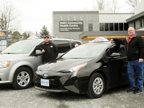 Norfolk council this week licensed Why Wait Taxi and Delivery of Tillsonburg to operate four vehicles in the county. Co-owners of the firm are Chris Lafond, left, and Norman Proctor. MONTE SONNENBERG / SIMCOE REFORMER