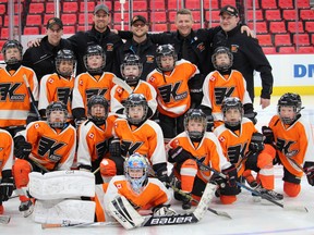 The Kincardine Home Hardware Novice Rep team are WOAA Champions and recently skated on the Detroit Red Wings home ice before their game on March 22, 2018. Pictured Back L-R: Aaron Geoghegan, Kyle Tout, Troy Elliot, Jeff Steven, Derek Frook. Middle: Dan Tout, Tristan Steven, Cayden McQuigan, Cal McQuillin, Tyler Bauman, Cohen Frook. Front: Carter Drennan, Kohlson Janes, Lucas Tout, Jack Elliot, Luke Walsh, Spencer Geoghegan, Craig Walker and Madden Walden.