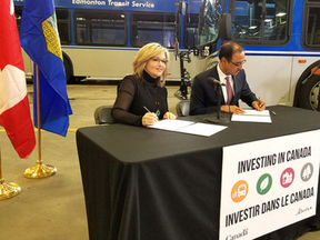 Alberta Infrastructure Minister Sandra Jansen (left) and federal Minister of Infrastructure and Communities Amarjeet Sohi sign the Investing in Canada Infrastructure Plan as a bilateral agreement between the two levels of government, resulting in a $15-million funding announcement for Strathcona County. The federal government will also spend more than $278,000 to improve the Fort’s transit system.