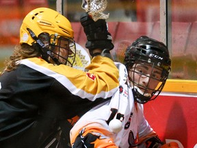 Owen Sound NorthStars Hayden Coulter takes a hit from the Hamilton Bengals Dawson Brown at the Bayshore in 2016. Coulter and the NorthStars will open their 2018 campaign against the Bengals at the Rec Centre on Sunday. James Masters/The Owen Sound Sun Times/Postmedia Network