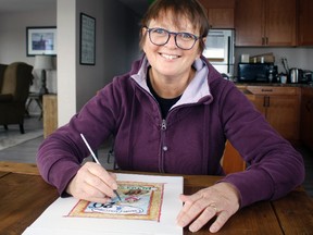 Artist Danita Phelan puts the finishing touches on a water-colour painting commenmorating the Cowgirl Cattle Company's 20th year of existance and the painting will be auctioned off at the CCC's Annual Rendezvous in Madden on May 5, 2018.  The Annual Rendezvous is a female only event that includes an evening with dinner, entertainment, shopping, all in support of agriculture in the west and the large group of women have raised close $250,000 over the past two decades for charity.