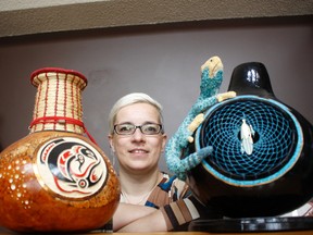Artist Fiona Verlinde displays a few of her exquisite gourds that she turned into works of art in her home studio west of Cochrane.