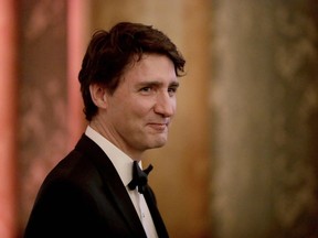 Canada's Prime Minister Justin Trudeau in the Blue Drawing Room for a drinks reception before The Queen's Dinner during The Commonwealth Heads of Government Meeting (CHOGM), at Buckingham Palace in London on April 19, 2018. 
Britain's Queen Elizabeth II, accompanied by Britain's Prince Charles, Prince of Wales, will receive Commonwealth Heads of Government and their spouses in the Blue Drawing Room, where the evening commences with a drinks reception. The dinner will take place in the Picture Gallery where Her Majesty will give a speech.Matt DUNHAMMATT DUNHAM/AFP/Getty Images