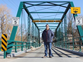 Rob Taylor, former chair of McLean Taylor Construction Ltd., stands in front of the Water Street bridge in St. Marys, which the company rehabilitated two years ago. Rob and his company were announced as the recipients of this year's Business Leader Award, which is presented by the Stratford and District Chamber of Commerce. JONATHAN JUHA/THE BEACON HERALD/POSTMEDIA NETWORK