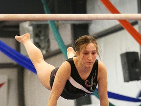 Madison Riopelle, of Confederation Secondary School, competes in the SDSSAA/NOSSA gymnastic championship in Sudbury, Ont. on Friday April 13, 2018. John Lappa/Sudbury Star/Postmedia Network