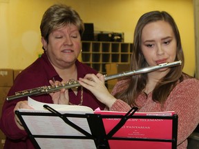 Alicyn Labelle, 17, is one of the music students who will be performing during the 78th-annual Porcupine Music Festival de Musique which kicks off on Wednesday. Labelle has memorized 14 pieces that she will be performing on flute and adjudicated on at various points throughout the two-week festival. She is seen here receiving instruction from her music teacher Audrey Jean Wells.