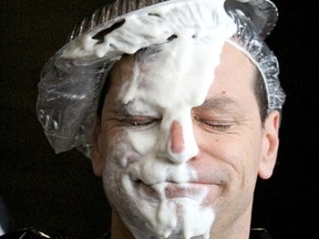 Rob Majic reacts after getting pied at St. Mary's College on April 18.