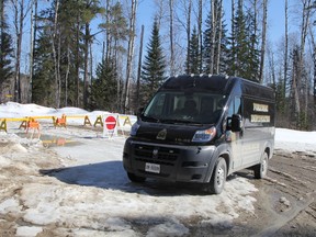 A Timmins Police Service forensic identification van is seen parked on Dalton Road, in front the barriers where Price Road has been closed on April 21. Six kilometres beyond this barrier, police say a charred 2004 Chrysler Intrepid was discovered with the human remains of four individuals. The Timmins Police Service confirmed the deceased individuals found at this scene were the members of a family reported missing shortly after the discovery of the vehicle on Price Road. 

(RON GRECH/The Daily Press)