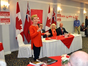 Ontario Premier Kathleen Wynne speaks during a nomination meeting in Owen Sound Saturday at which Francesca Dobbyn, seated behind Wynne in centre, was acclaimed as the provincial Liberal candidate for Bruce-Grey-Owen Sound. (DENIS LANGLOIS/THE SUN TIMES)