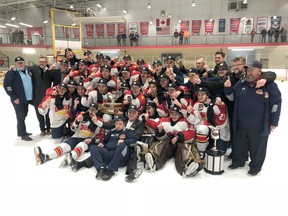 BRUCE BELL/THE INTELLIGENCER
The Wellington Dukes pose with the Buckland Cup after a thrilling 4-3 overtime win against Georgetown in overtime at Essroc Arena on Sunday night to take the OJHL final in six games. The club now heads to Dryden for the Dudley Hewitt Cup May 1 – 5. They will open against the host Dryden Ice Dogs on Day 1 at 7:30 p.m. They are joined by the SIJHL champion Thunder Bay North Stars, while the Cochrane Crunch led the Rayside Balfour Canadians 3-2 heading into Game 6 of the Northern Ontario Junior Hockey League final on Tuesday night.